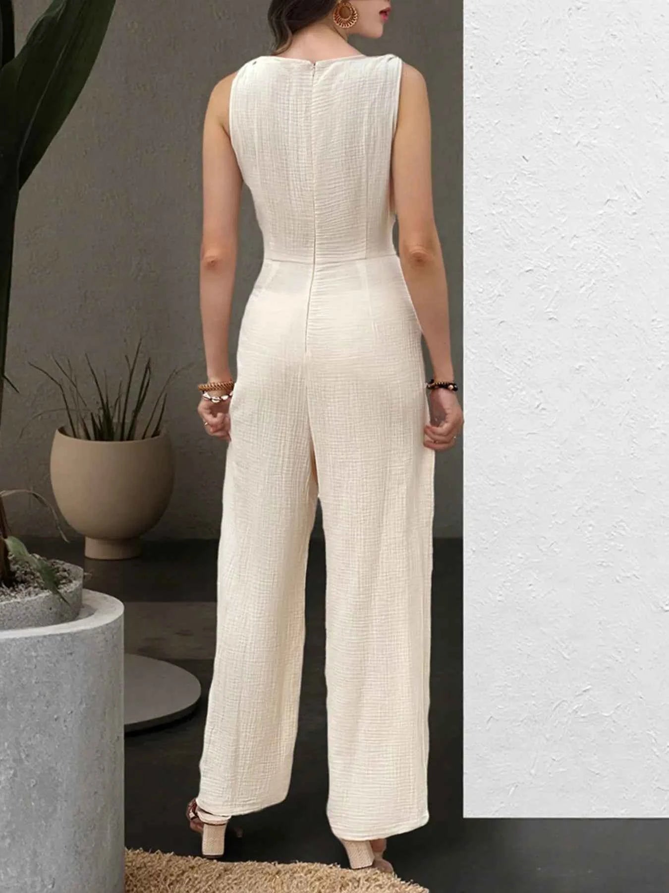 Sleeveless V-Neck Wide Leg Jumpsuit 3a130e1a19d94a42b8d195a3d2acf415-Max-Origin