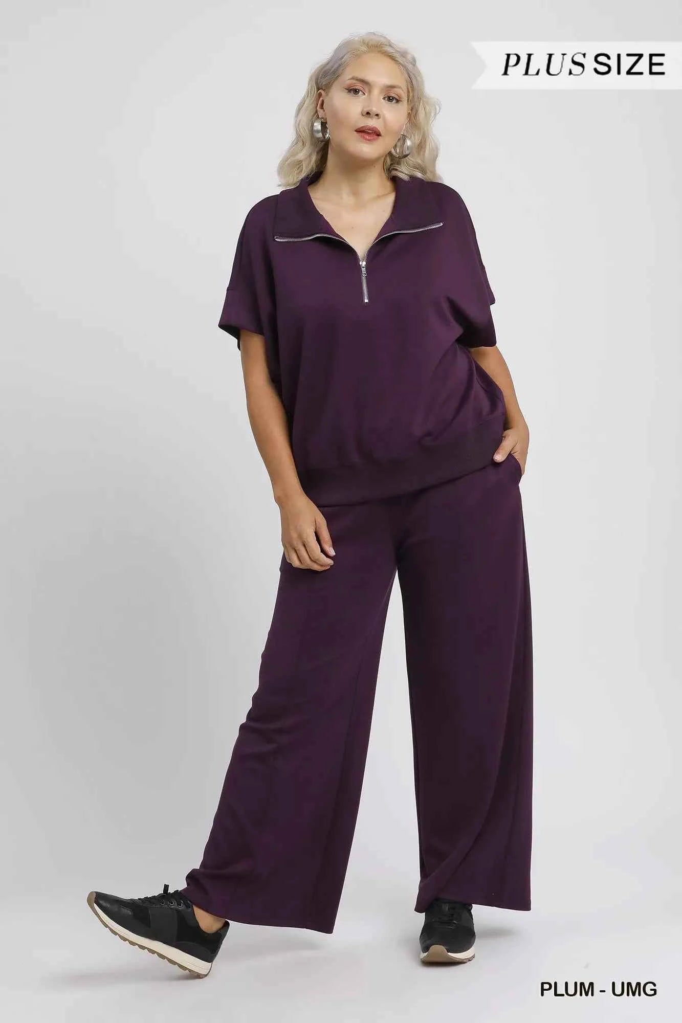 Umgee Full Size Half-Zip Short Sleeve Top Plus Size 3e1b194f-794d-4854-9192-fd5059d5515f-Max-Origin