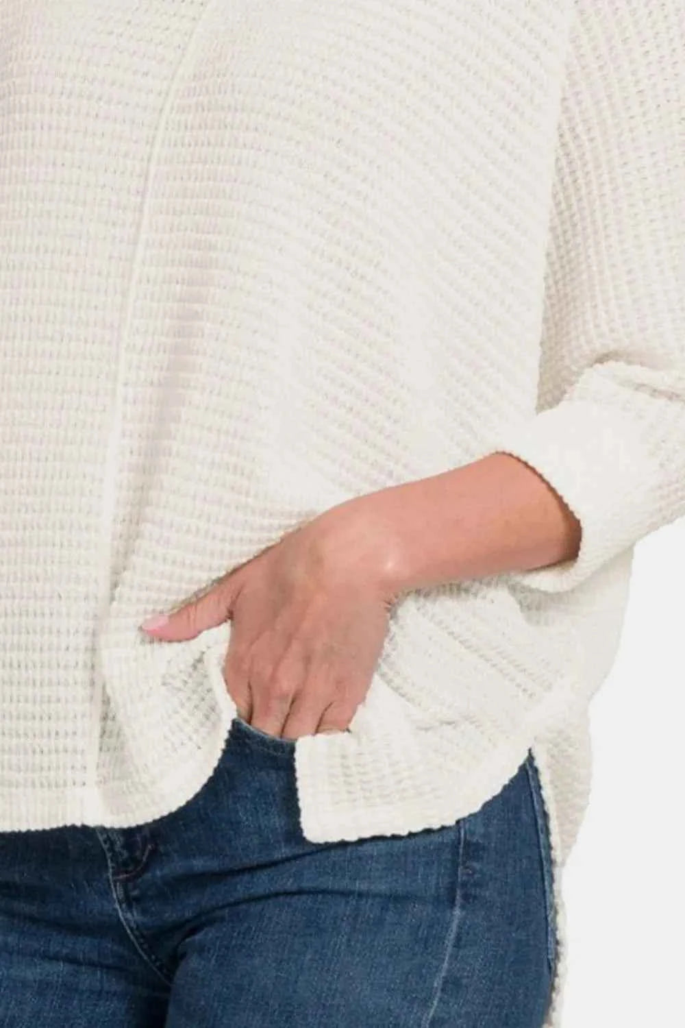 Full Size Round Neck High-Low Slit Knit Top 3ee3986d-5300-4293-af72-39b733ee7b25-Max