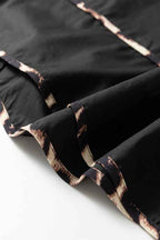 Plus Size Leopard Contrast Tie-Neck Mini Dress 41053811-2bb5-42c5-81e4-656862f7126a