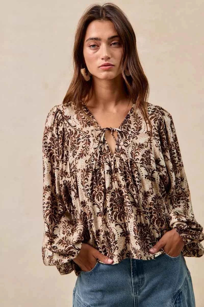 BiBi Printed Woven Front Tied Blouse with Baloon Sleeve 418202e31a1e42d2b114d55a76620e7e-Max-Origin