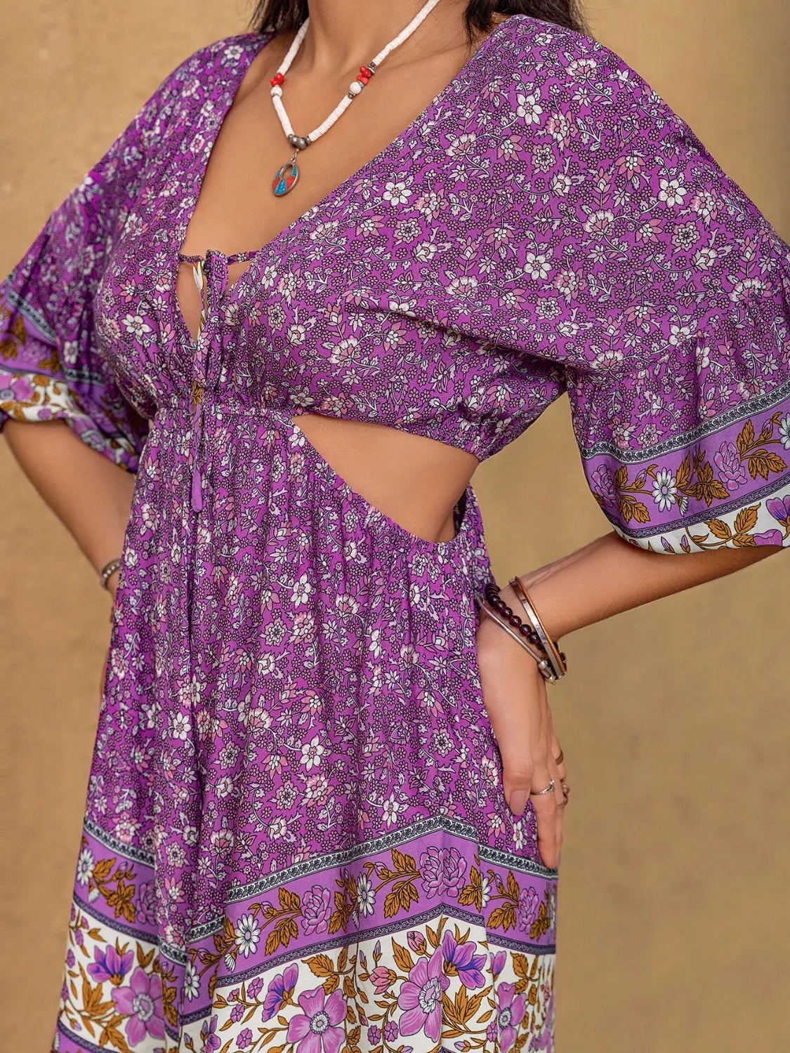 Tied Front Cutout Printed Romper 41925984-4a04-4d3d-bb58-d3fbcd69fe23-Max-Origin