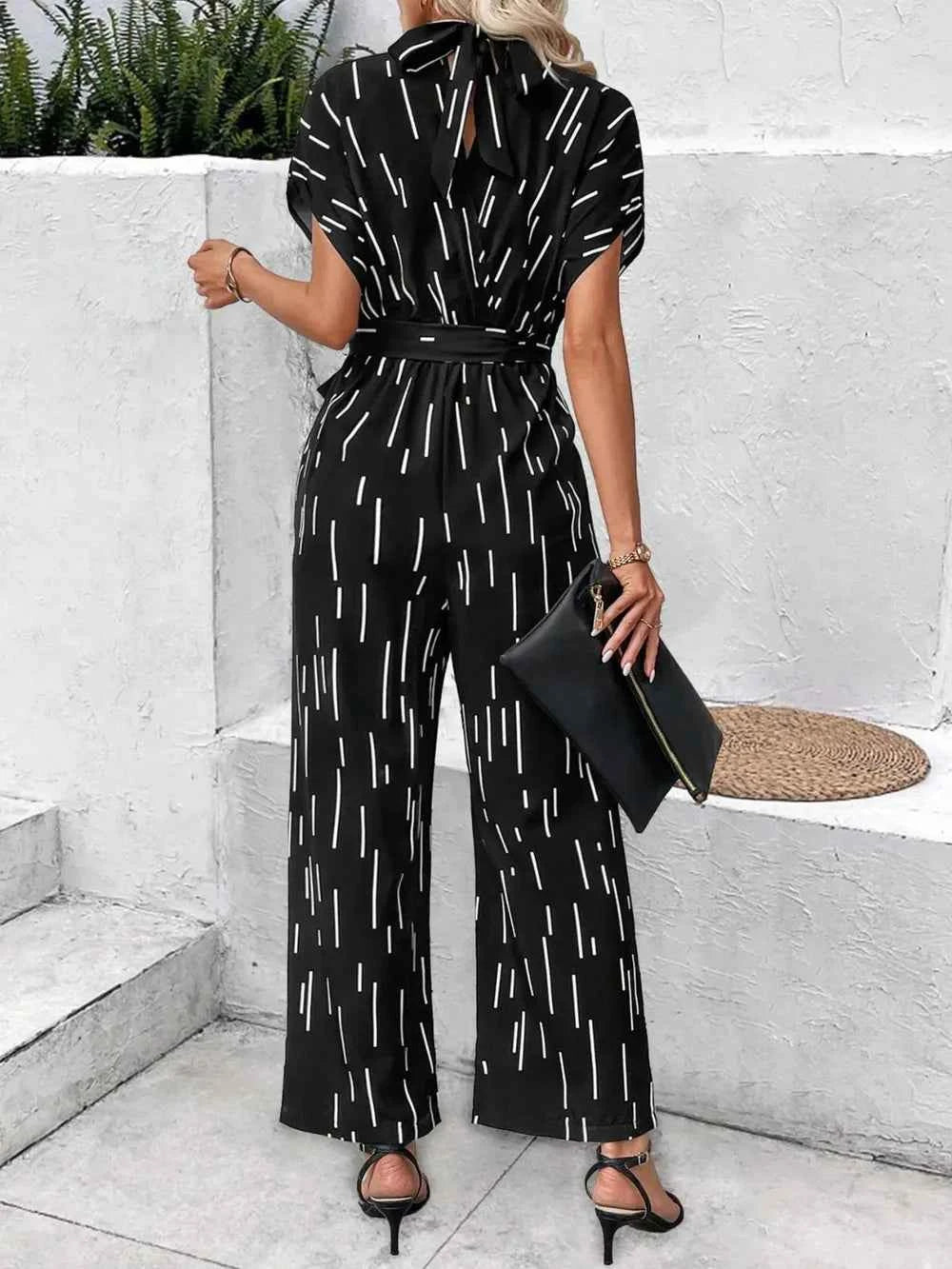 Tied Printed Mock Neck Wide Leg Jumpsuit 438656bf-e5ca-47e4-9043-d78b92d299c0-Max