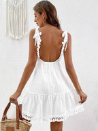 Surplice Summer Mini Dress with Tassel Hem 45e55bba63764e4cba58622ec2a633fd-Max-Origin