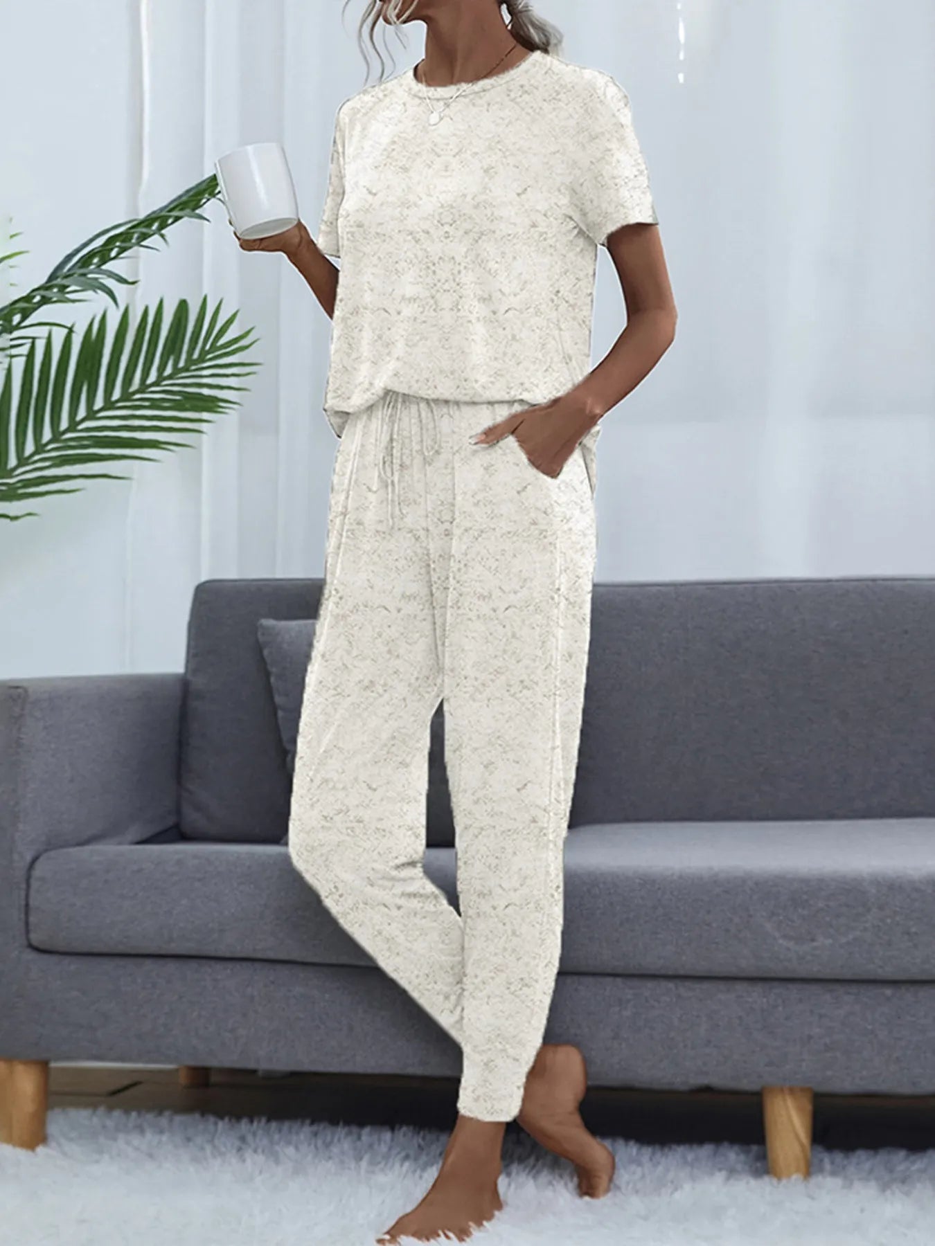 Round Neck Short Sleeve Top and Pants Lounge Set 49700579b30a48198cad7b034b145389-Max-Origin