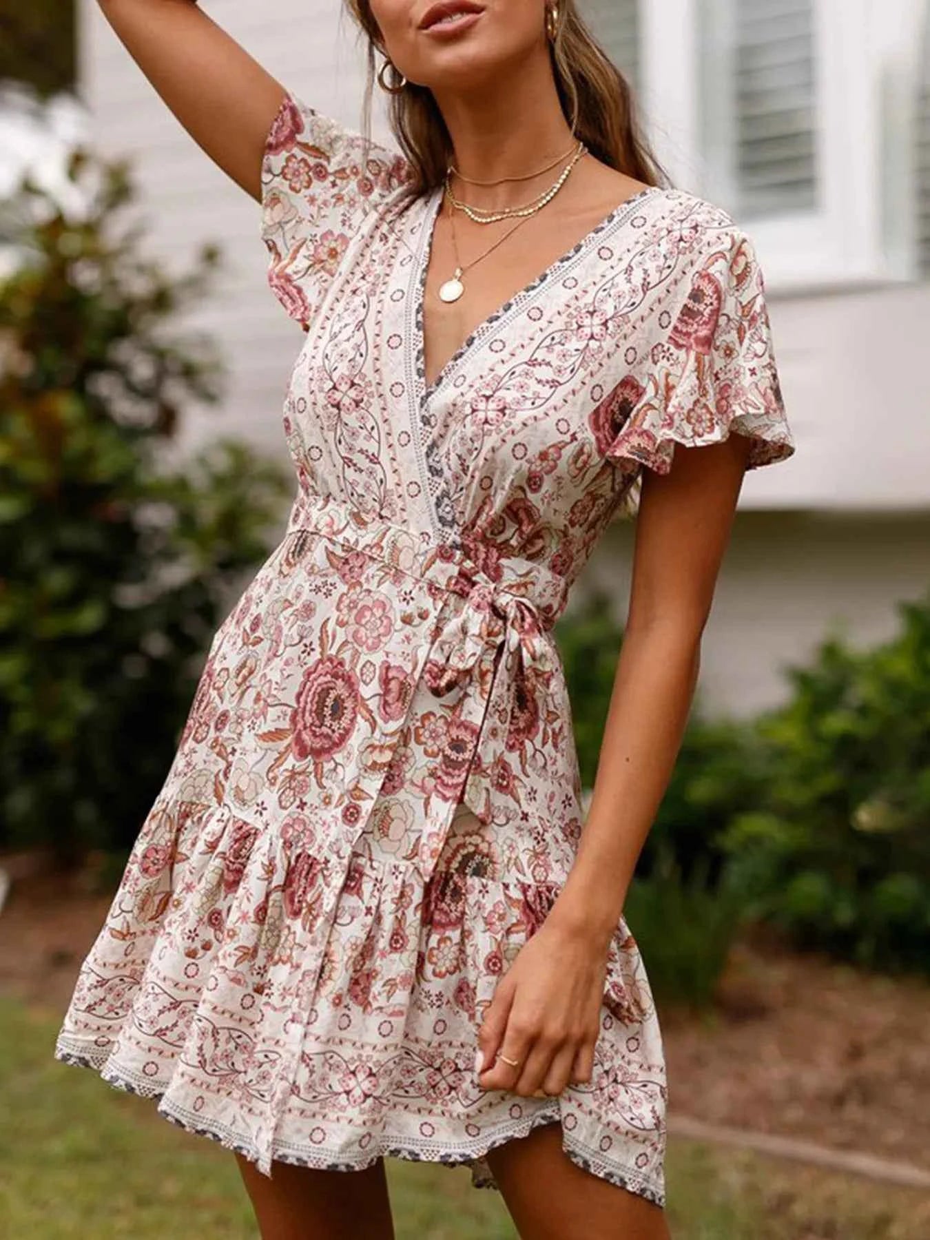 Surplice Flutter Sleeve Mini Dress 50daca69a33545e4803dc9f315252c6f-Max-Origin