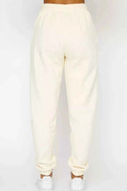 Round Neck Sweatshirt and Joggers Set 5389032b-6097-437b-8449-6af4f3b98c57-Max-Origin