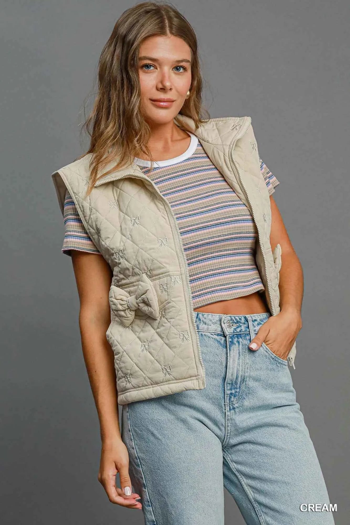 Umgee Sleeveless Quilted Vest with Bow Details 54f62c6a-e364-40a1-a7f0-8a8b86707feb-Max-Origin