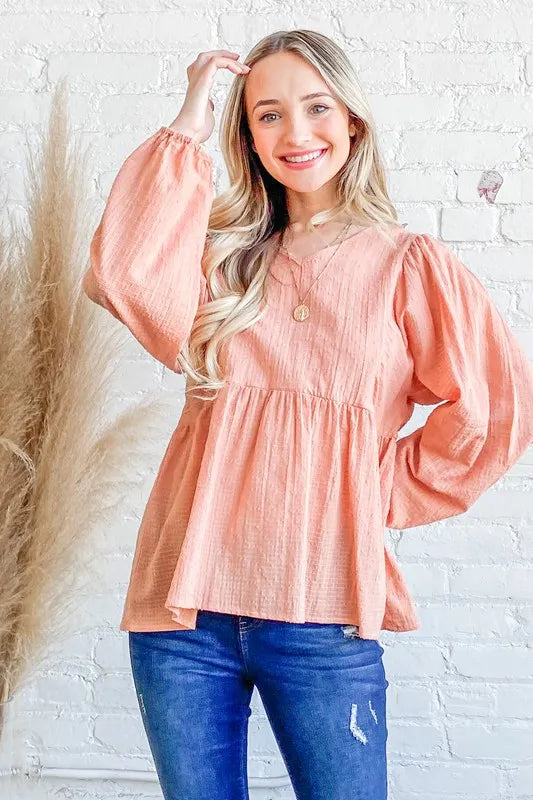 Textured V-Neck Babydoll Blouse with Ruffled Sleeves 550ccae9647e47eb9d330b86fac60126-Max-Origin