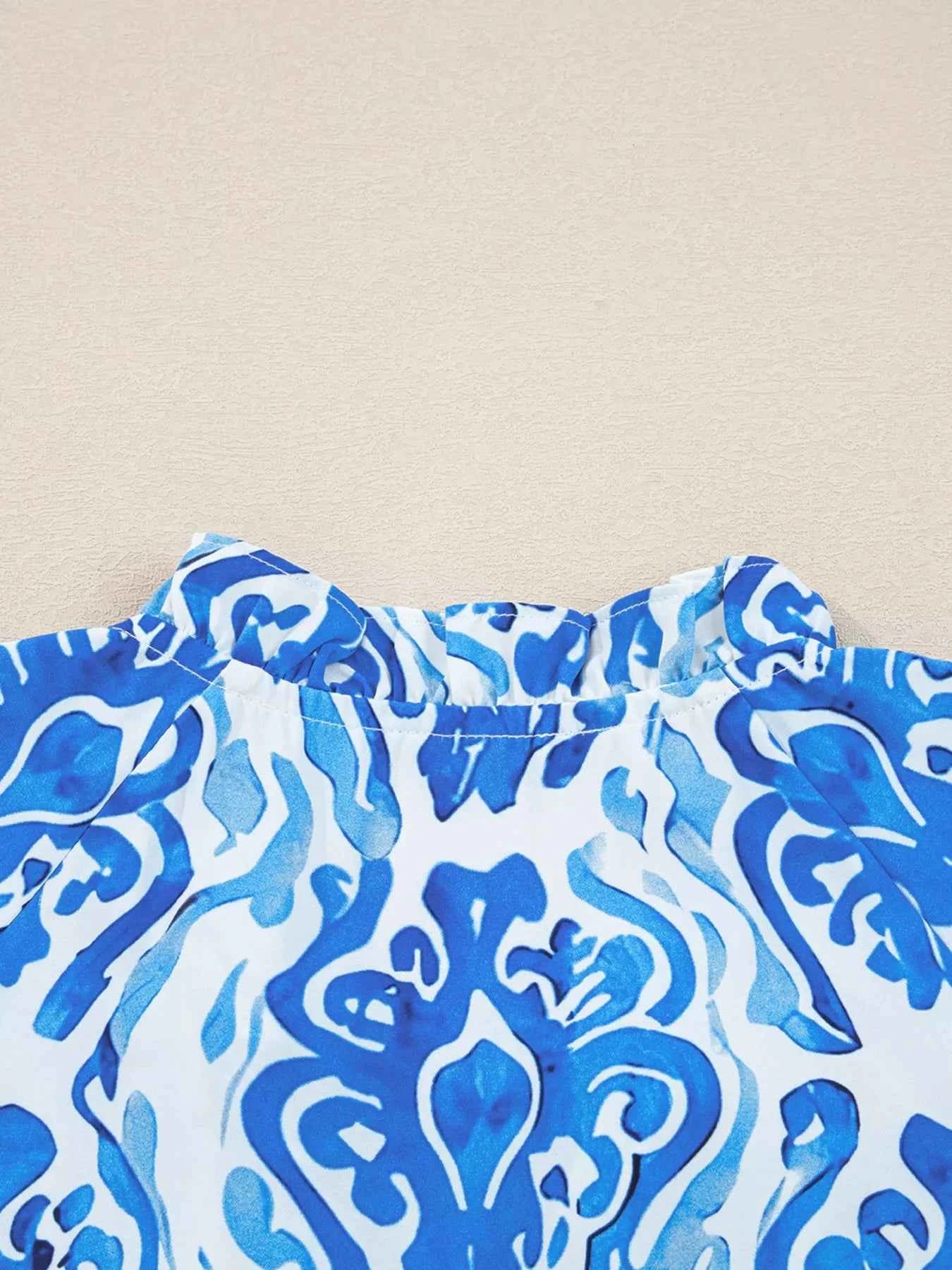 Printed Tie Split Neck Button Front Puff Sleeve Shirt 55ea5c8ec5ae4665b7c8f78c1cccb12a-Max-Origin