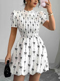Smocked Bow Print Short Sleeve Dress White 55f3d6cc445f4e7692d395342f6a37f2-Max-Origin