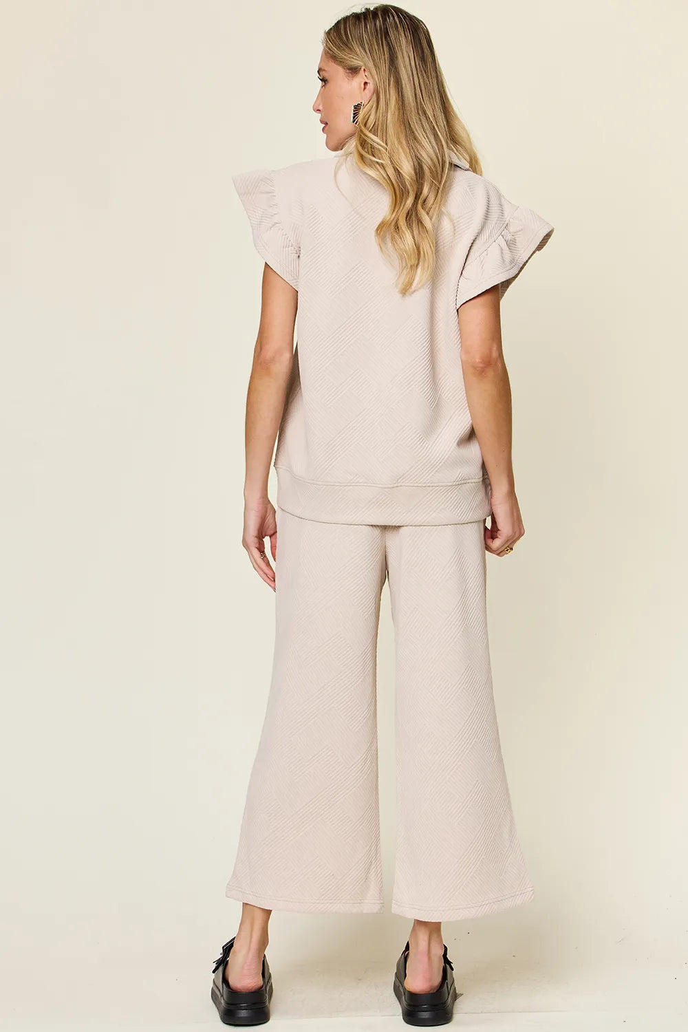 Double Take Texture Ruffle Short Sleeve Top and Drawstring Wide Leg Pants Set 56c5bae0-771b-43a7-874b-edb4f84388a0-Max