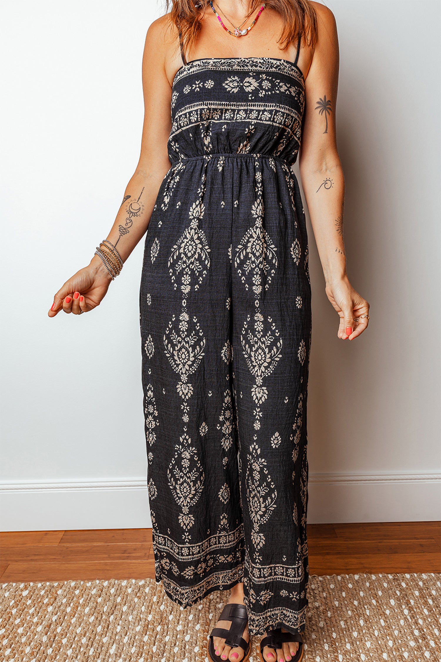 Black Spaghetti Straps Elastic Waist Loose Ethnic Print Jumpsuit 57177d88c79e2b49