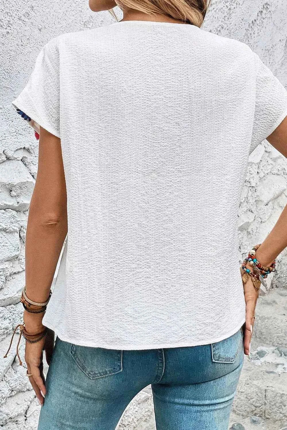 Tassel Tie Neck Short Sleeve Blouse 57fd2a49-bb70-4863-a96b-95d6969c72c1-Max