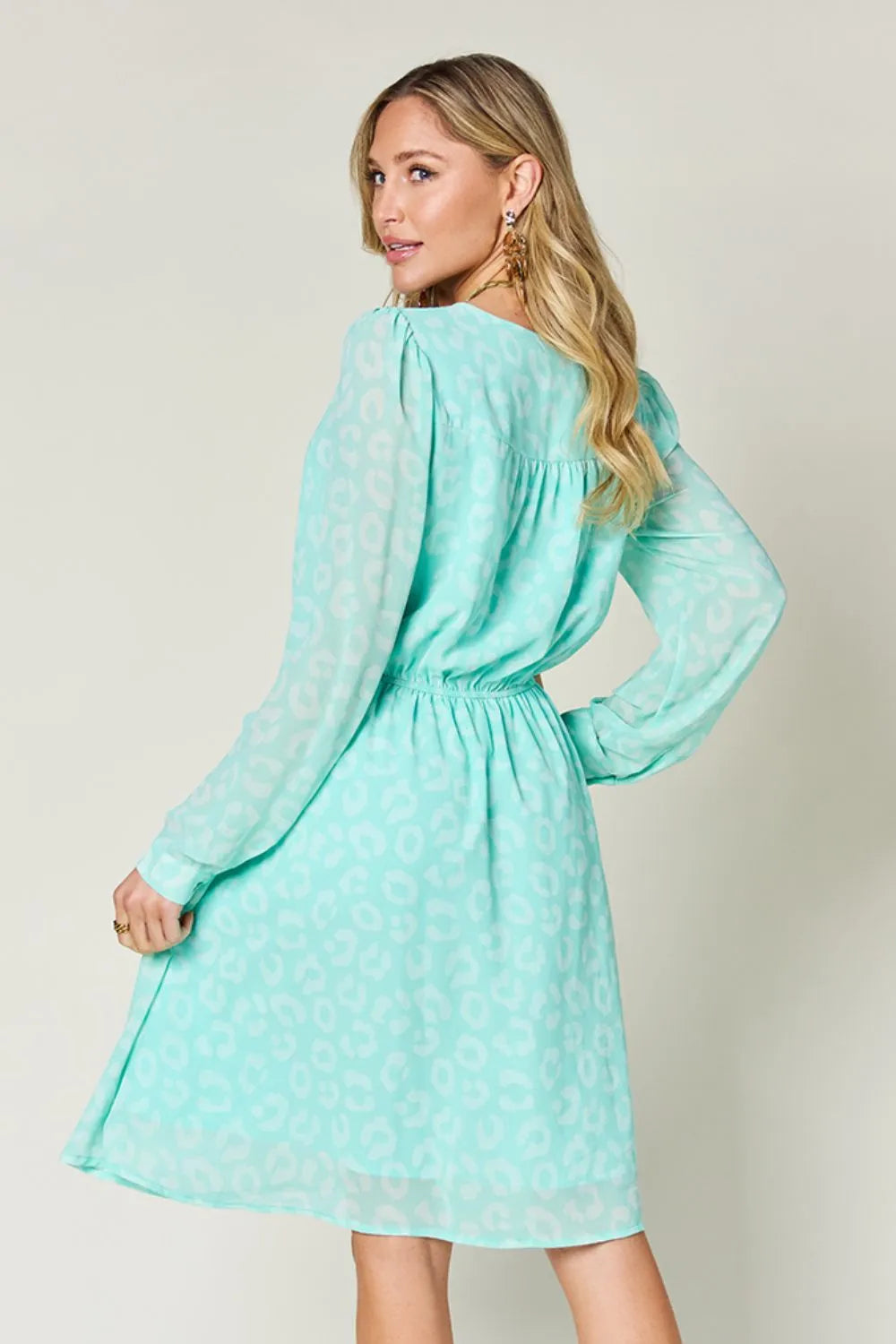Double Take Full Size Printed Ruched V-Neck Long Sleeve Dress 59297372-8c55-4950-afb5-a152015a5a76-Max