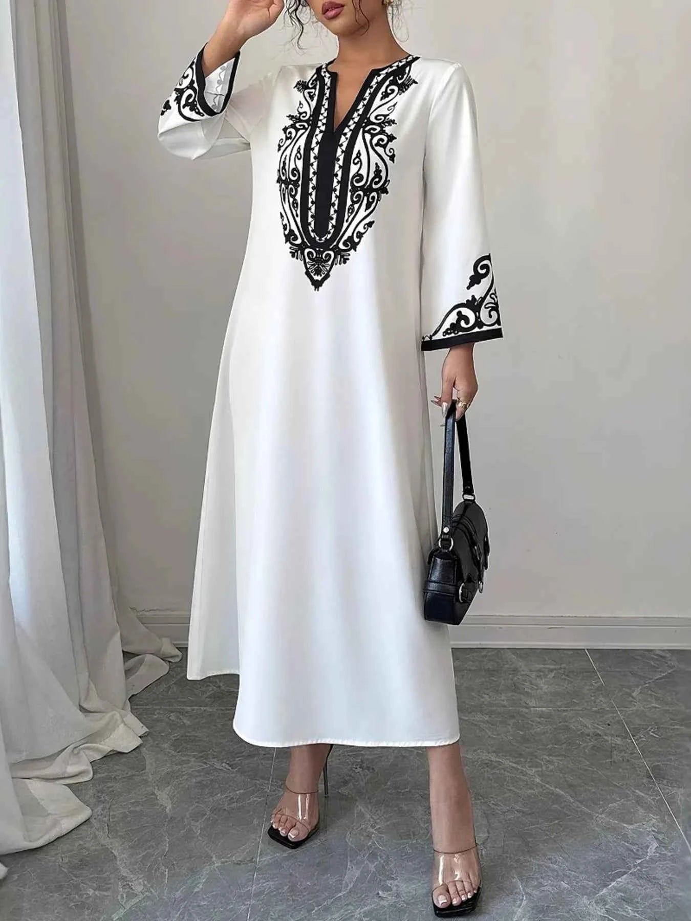 Printed Notched Long Sleeve Midi Dress 597eb309c0e04d55b9196d089885cae4-Max-Origin
