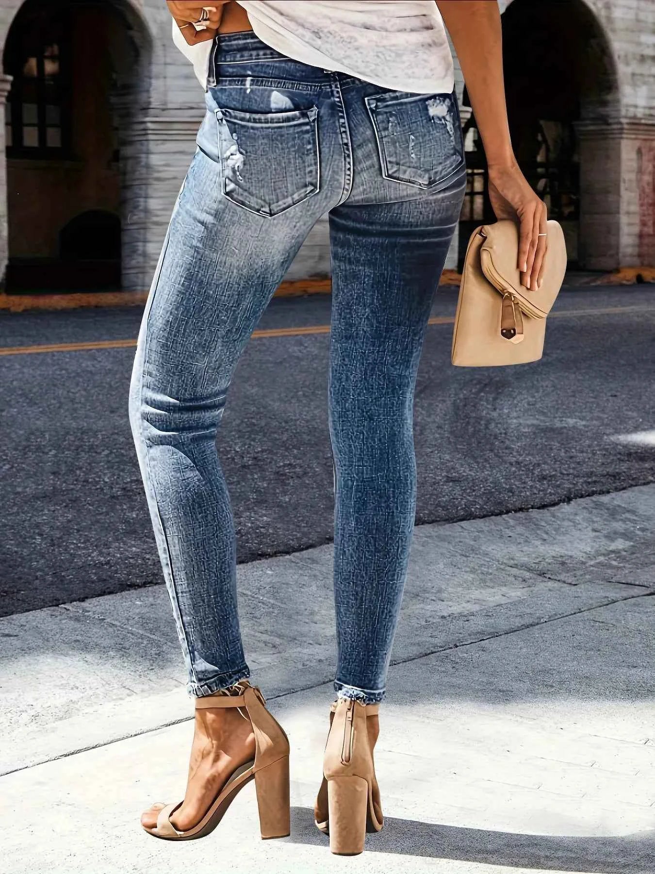 Distressed Skinny Jeans 5befe74666644ae888cc92c779a7311a-Max-Origin