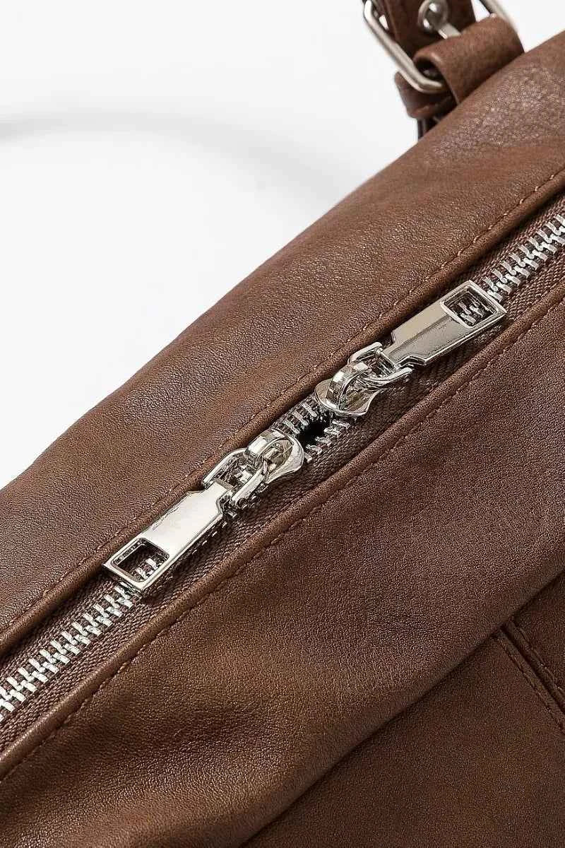 Fame Multi Grommet Belt Strap Rustic Rectangular Hand Bag 5ca513cf74fb4bb6ae28db1b6b8da71d-Max-Origin