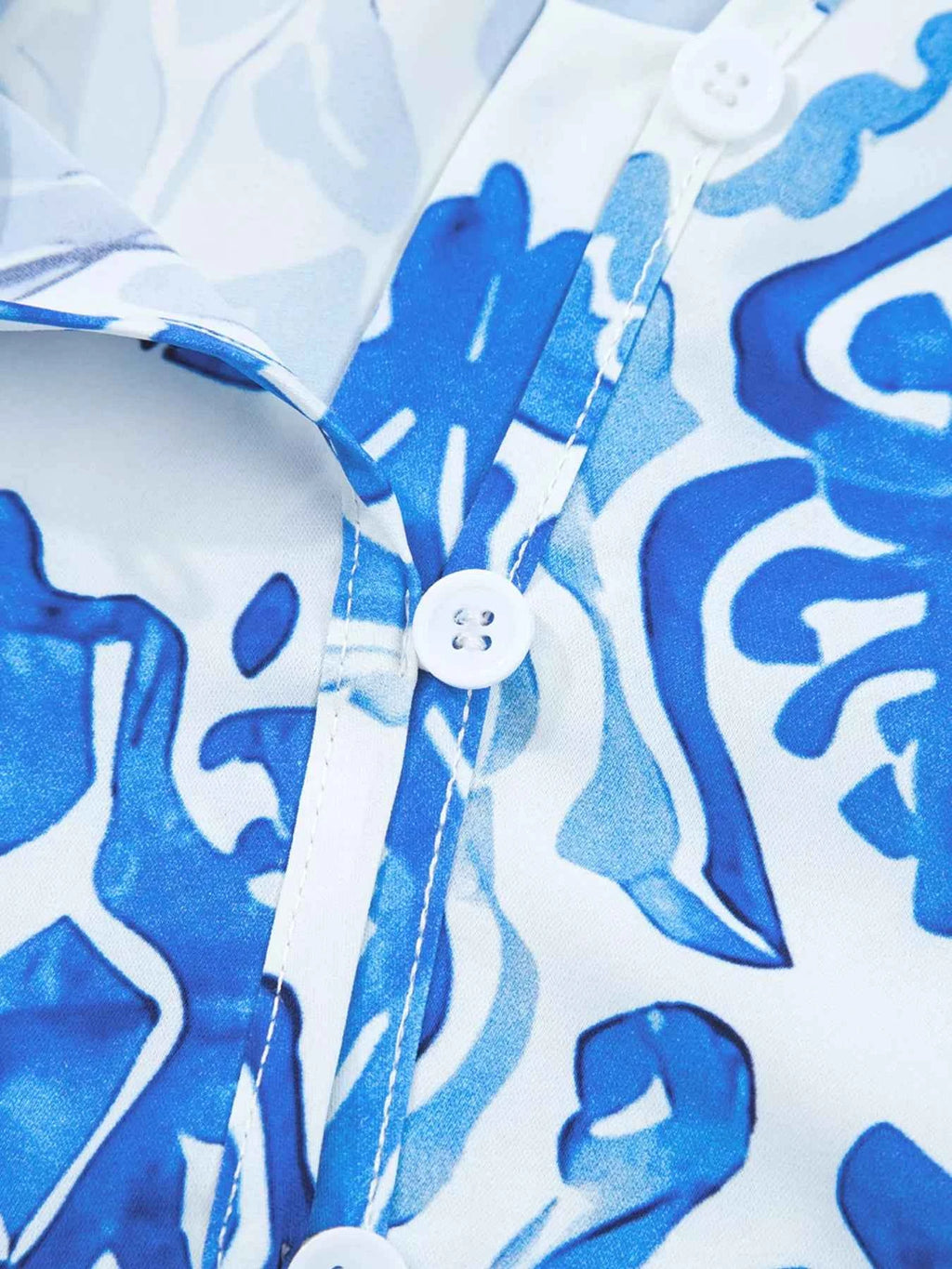 Printed Tie Split Neck Button Front Puff Sleeve Shirt 5e739766e6574234a3629cd5893bde6a-Max-Origin