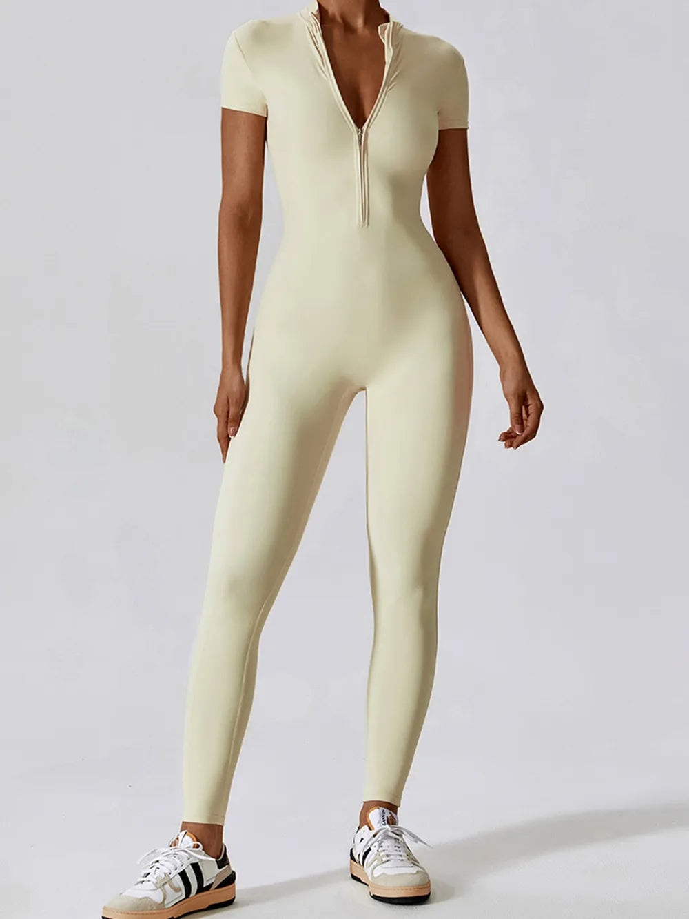 Basic Bae Half Zip Short Sleeve Active Jumpsuit Light Yellow 5f38b85c-b5dd-4124-a549-428a95f4b1be-Max