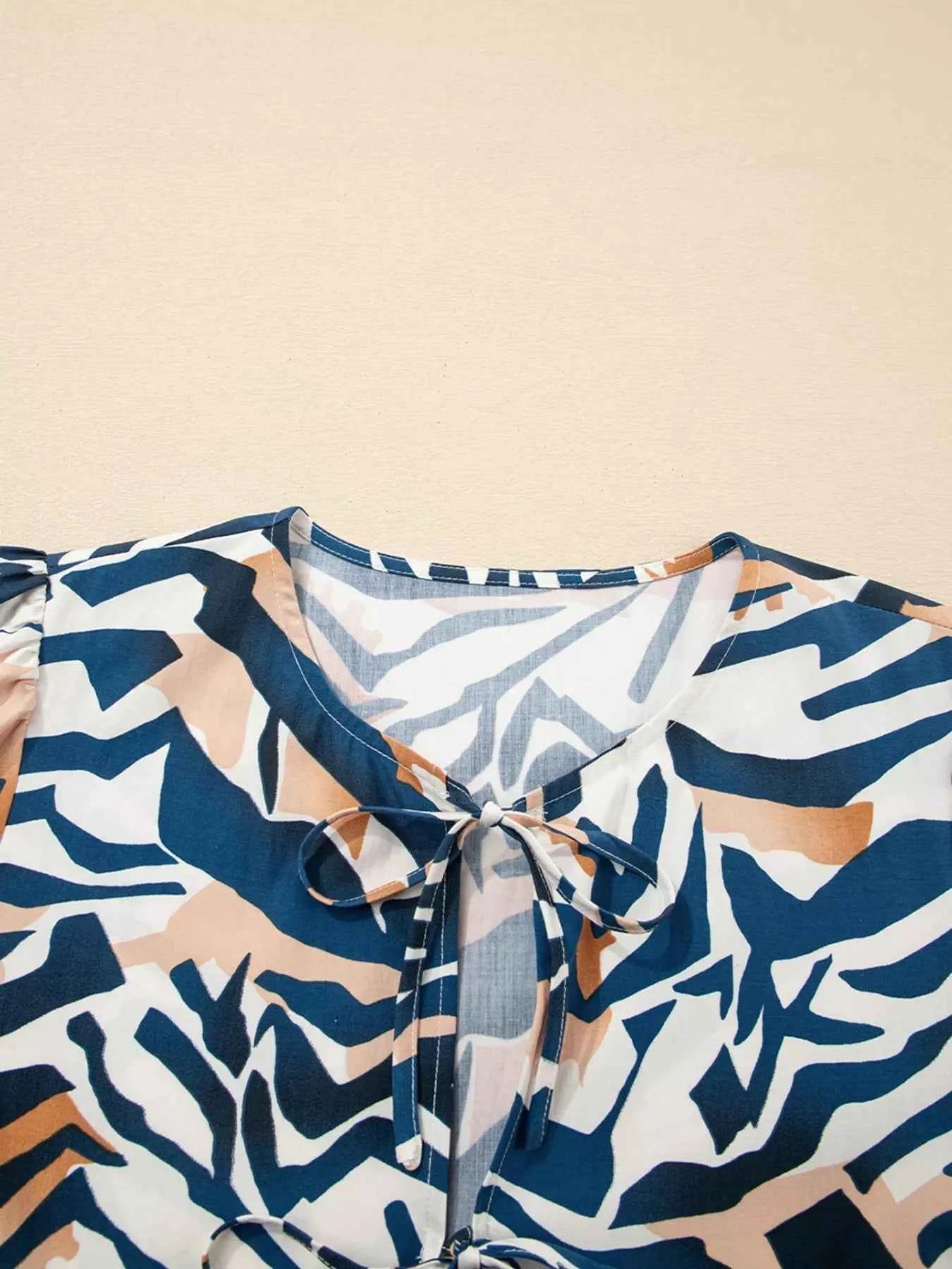 Zebra Print Tied Front Puff Sleeve Top 645da86f470e4314973370eaa305d81d-Max-Origin