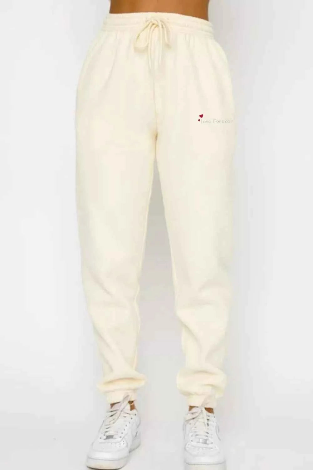 Round Neck Sweatshirt and Joggers Set 66c88318-ea52-4384-9d78-6a0a7d9c39b5-Max-Origin