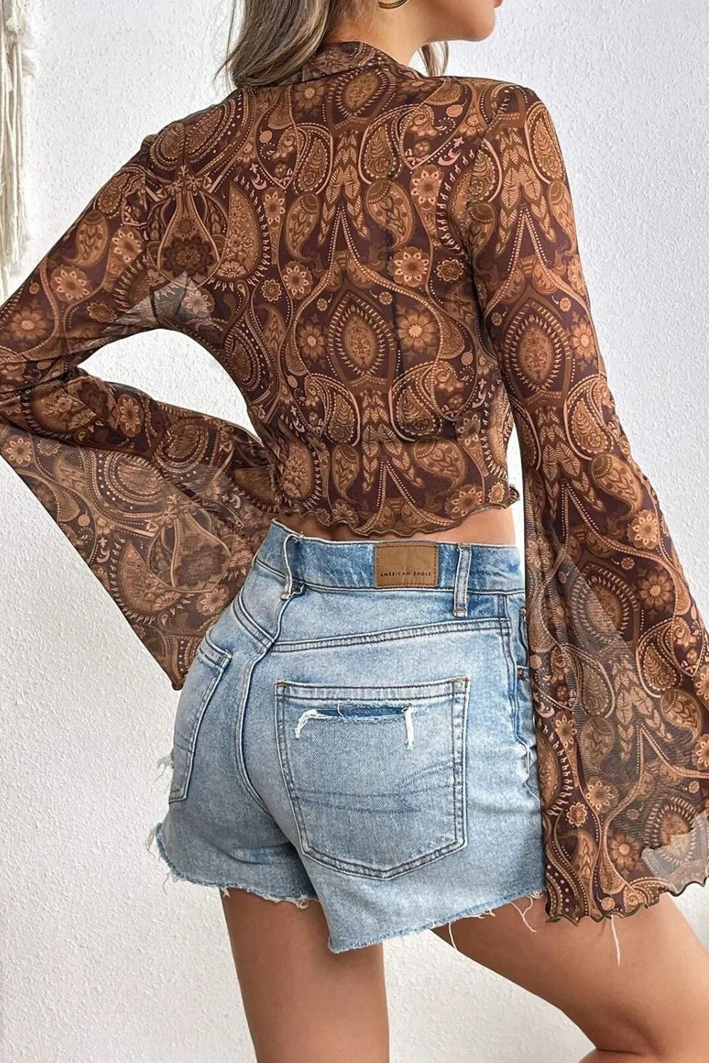 Printed Mock Neck Flare Sleeve Top 6896e49e-65e0-46cf-bc2d-8f576fbc67cd-Max
