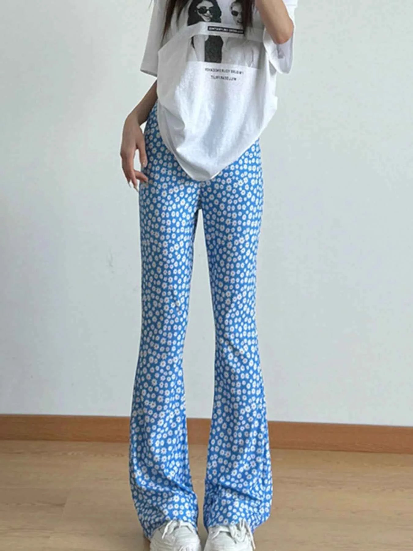 Floral Print Flare Leg Pants 6955eab7-e104-4c52-956d-03fae8a4f95f-Max-Origin