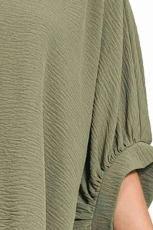 Woven Airflow V-neck Puff Half Sleeve Top 6958f64a-c91d-48b3-8d75-aea127e497de-Max-Origin