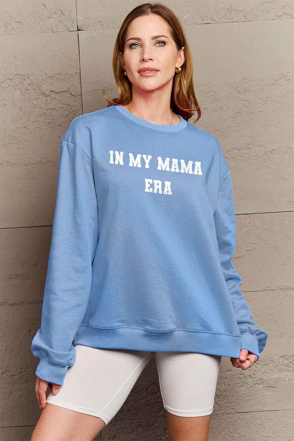 Simply Love Full Size IN MY MAMA EAR Graphic Sweatshirt Pastel Blue 6bee9f75593e4880ae50459b8125ba32-Max