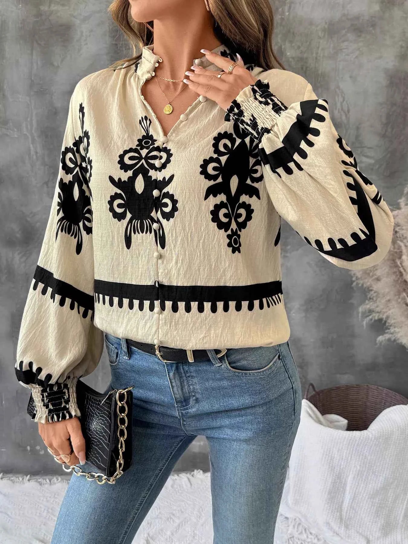 Printed Notched Lantern Sleeve Blouse 6c1a368e938e4683b1697fdff2470ff6-Max-Origin