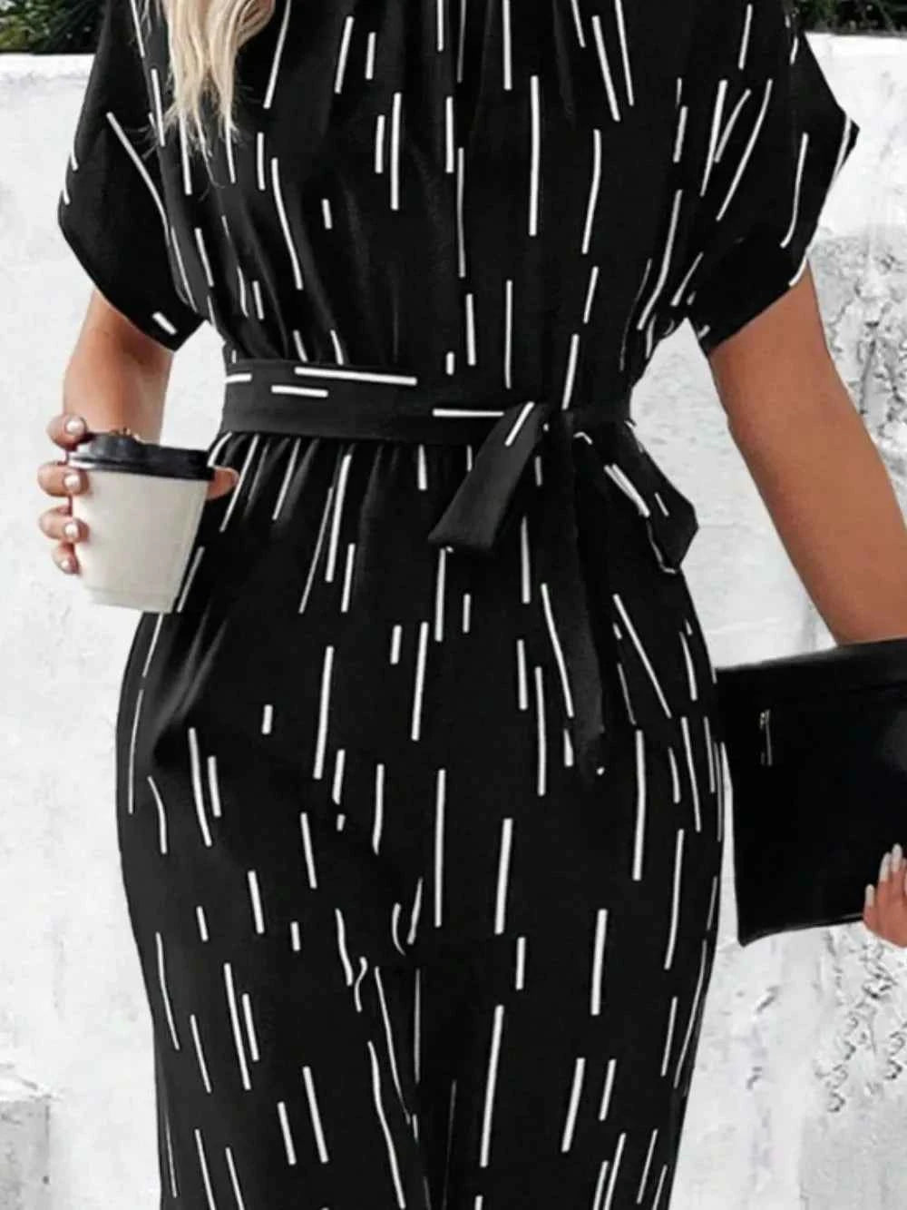 Tied Printed Mock Neck Wide Leg Jumpsuit 6ddb2388-cc05-4d53-802f-9f9c2022df70-Max