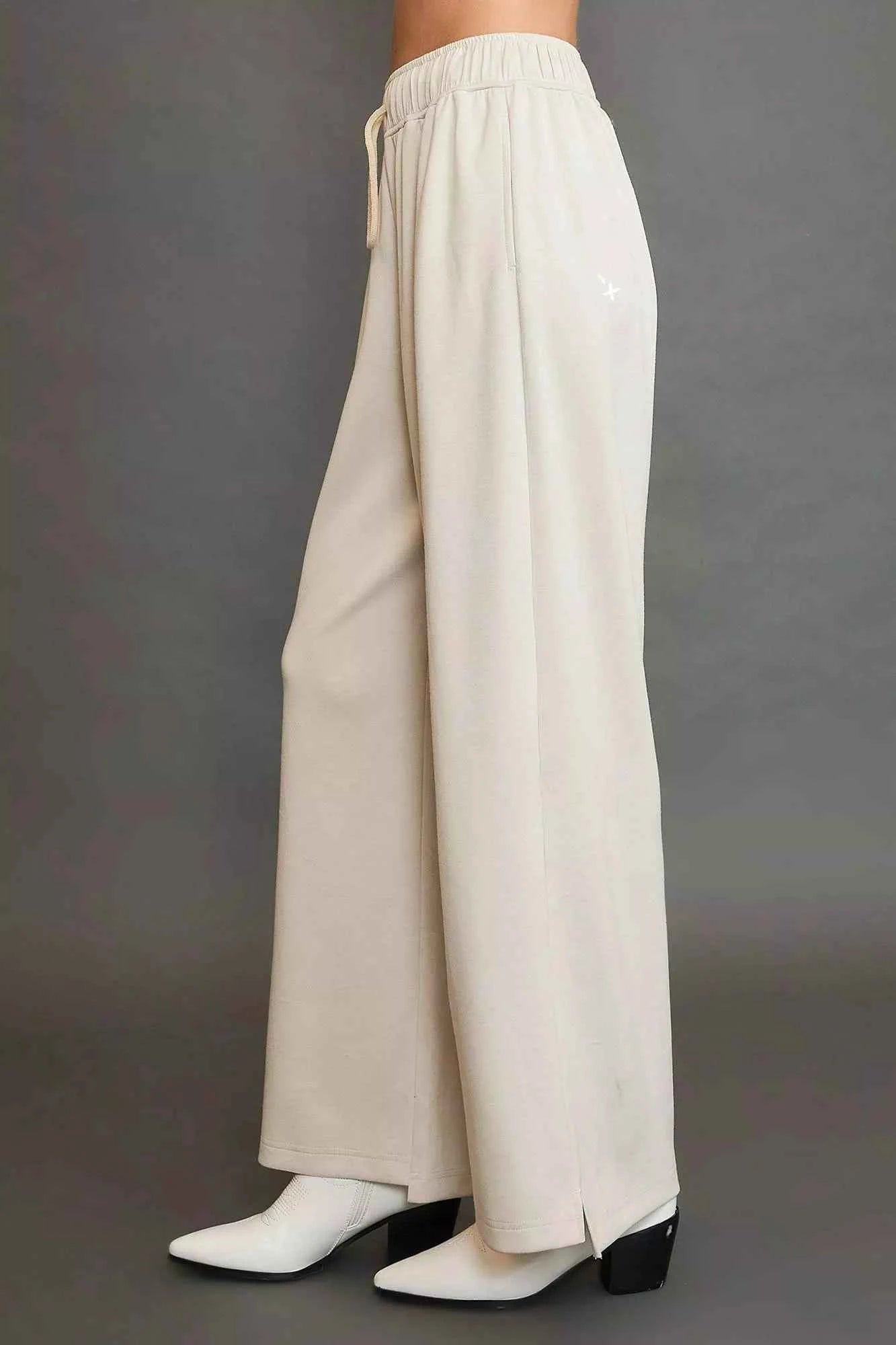 Umgee Elastic Drawstring Waistband Wide Leg Pants 6e083fa2-d289-4c2f-becf-59804d617b27-Max-Origin