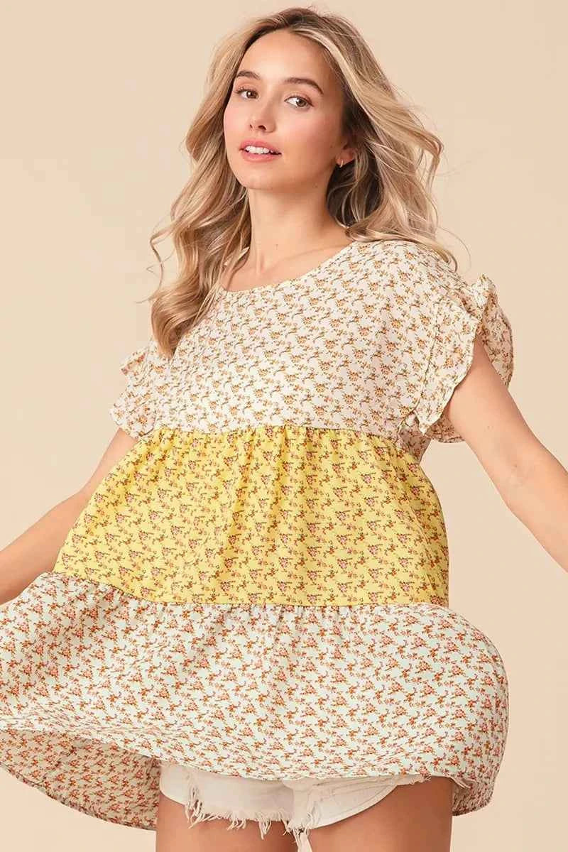 BiBi Flroal Printed Woven Color Block and Tiered Top 6ea1291608a34d3e97bf44926f495a07-Max-Origin