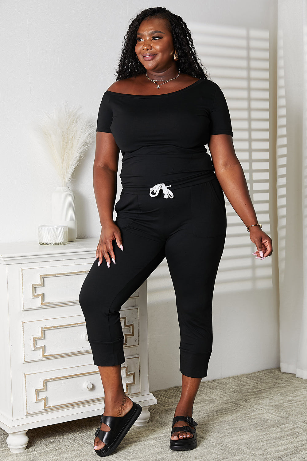 Double Take Asymmetrical Neck Tied Jumpsuit with Pockets 70142555a2de4f5aa5cadf315889e163-Max