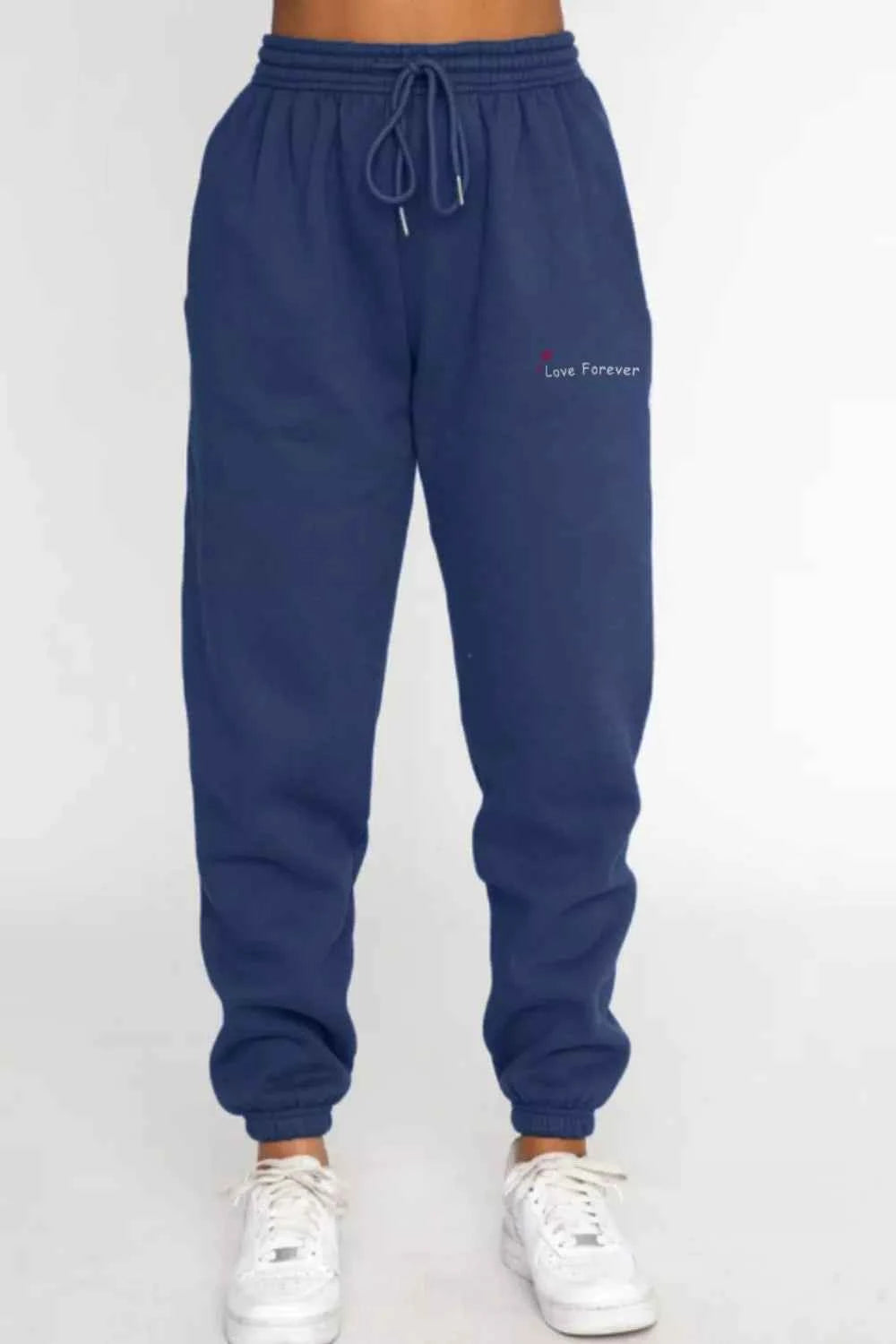 Round Neck Sweatshirt and Joggers Set 70b1622a-c821-44a2-8ae6-5e51f40d43b2-Max-Origin