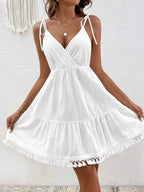 Surplice Summer Mini Dress with Tassel Hem 71056b0b37aa44bb8e4ea455636c0e3f-Max-Origin