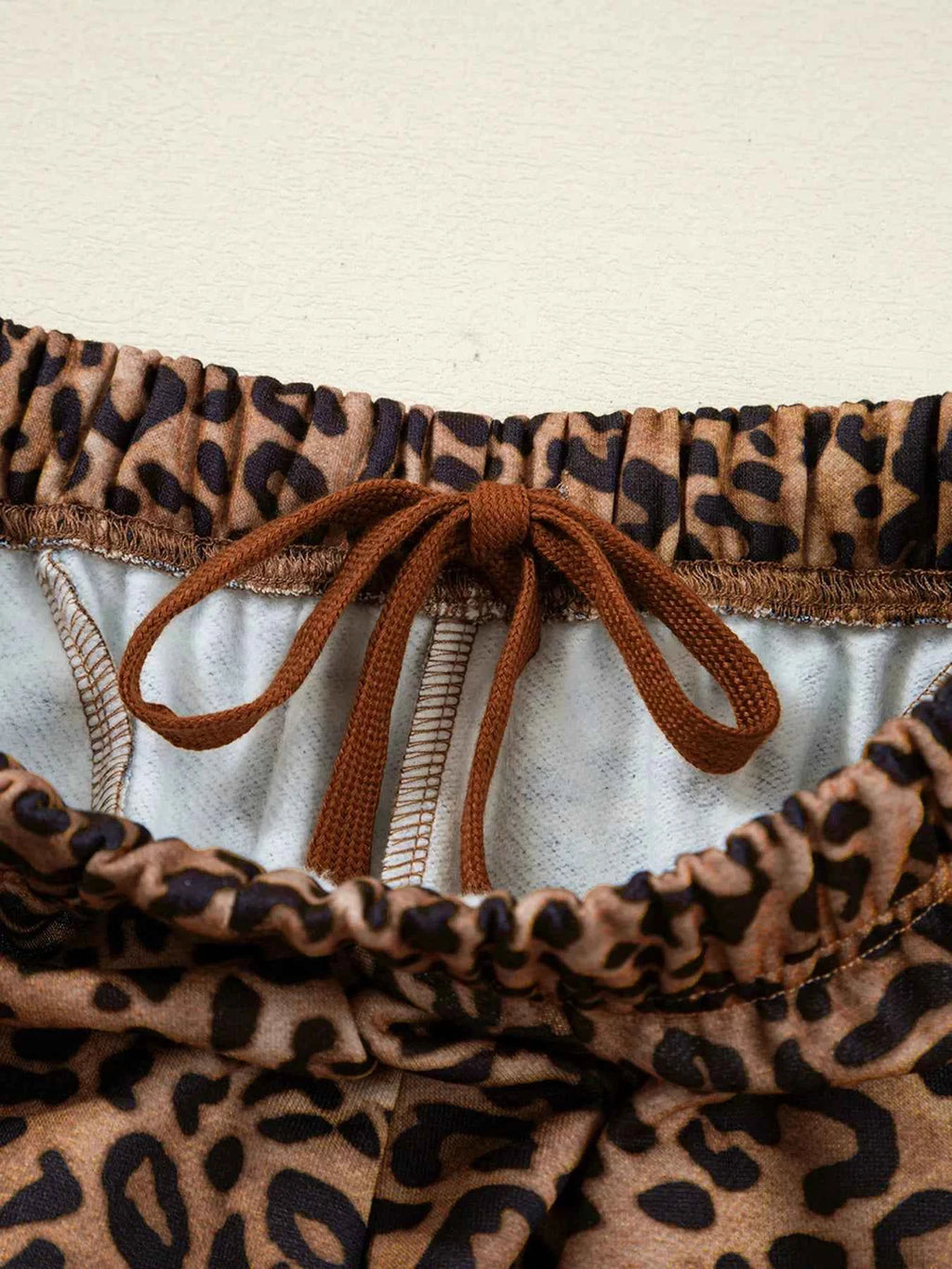 Leopard Print Contrast Trim Long Sleeve Top and Pants Set 724bf4972f394f138a97eb05afa44745-Max-Origin