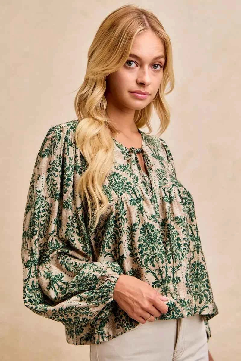 BiBi Printed Woven Front Tied Blouse with Baloon Sleeve 79dcfe3a3e7c48618ea9b669d8deb27d-Max-Origin