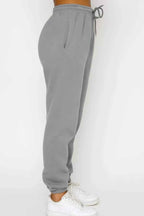 Round Neck Sweatshirt and Joggers Set 7ba20432-4915-4d25-966a-35d32300fb1d-Max-Origin