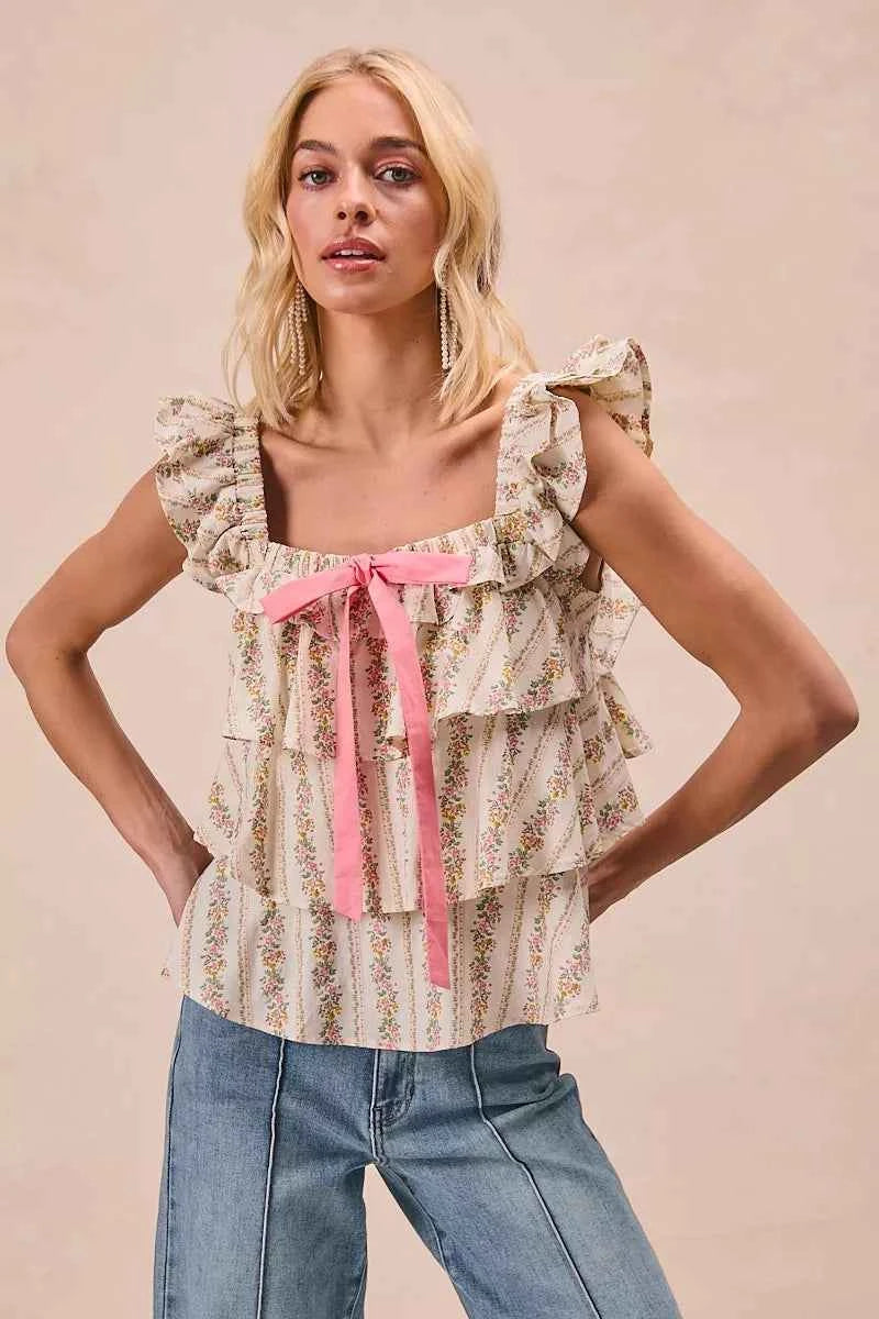 BiBi Floral Printed Woven Front Bow Tied Ruffled Square Neck Sleeveless Top IVORY 8182c059df3d44e294830133467f6767-Max-Origin