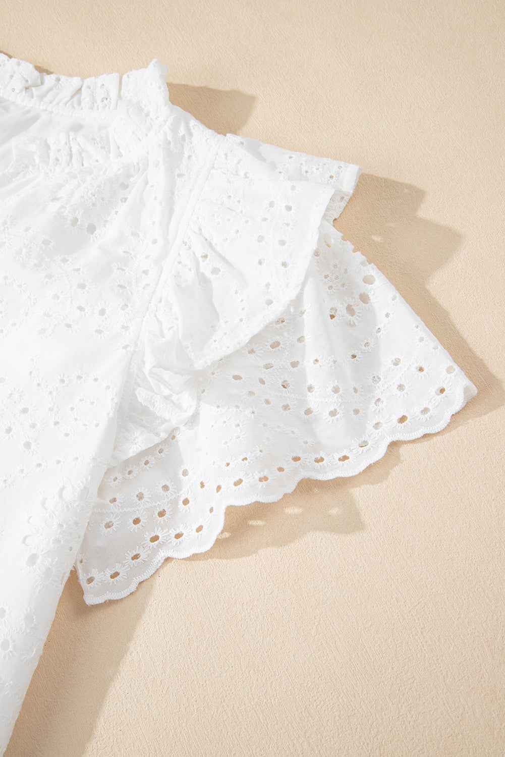 White Eyelet Flutter Sleeve V Neck Blouse 818cda5a3855bd36