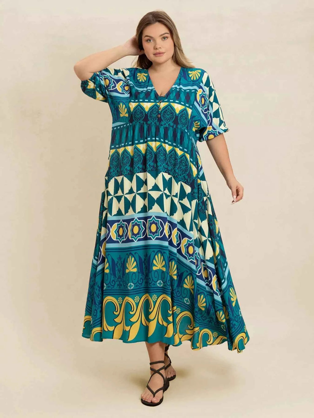 Plus Size Printed V-Neck Half Sleeve Midi Dress 81b8caf1-ceec-4fe2-a1fe-3a8180b50ed4-Max-Origin