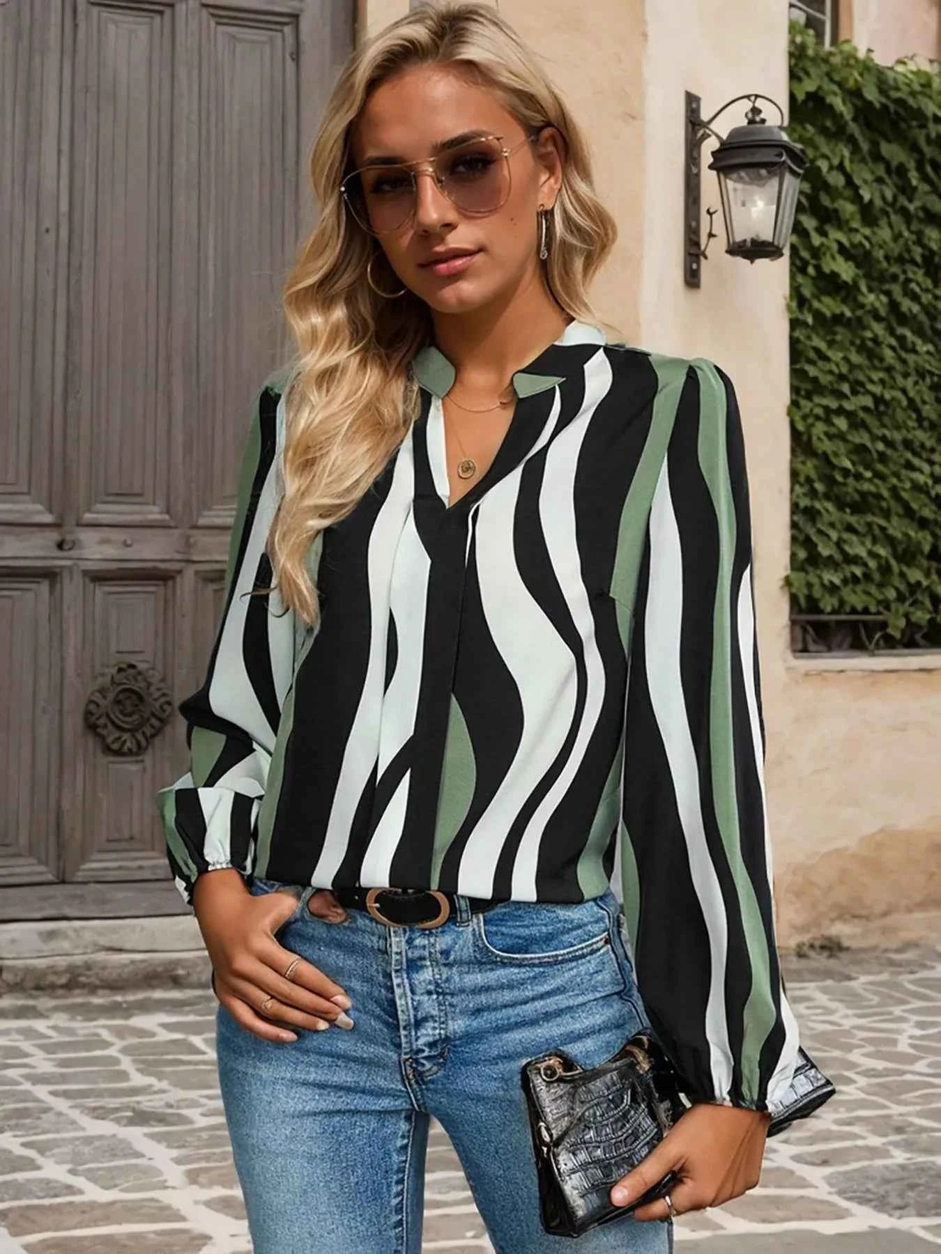 Striped Notched Long Sleeve Blouse 82d6b317-377e-40cb-bbda-4431ed103f33-Max-Origin