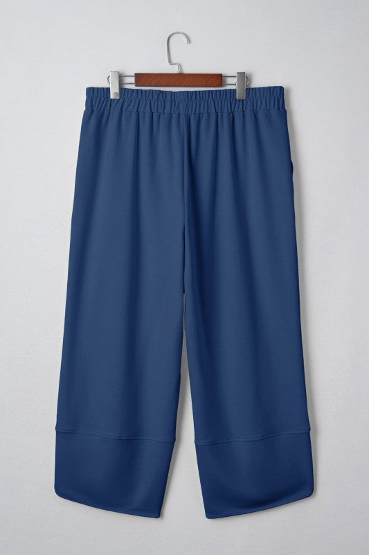 Plus Size Solid Asymmetrical Hem Capris Pants 83c45a5b-8402-4f08-b5de-eba21a445011
