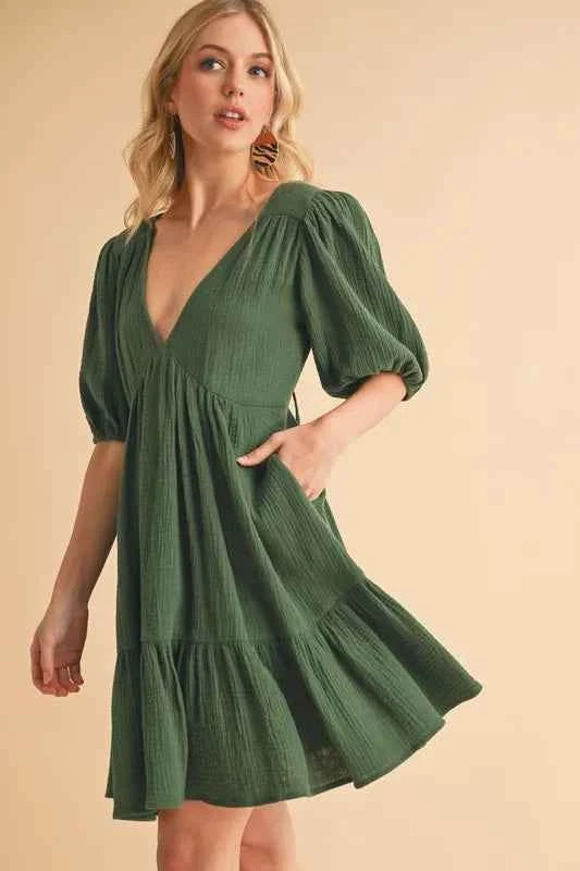 Aemi+Co Tied Back Ruffled Short Sleeve Mini Dress 8498ebf86d4f4321bbbcfdb7f6bdb0bb-Max-Origin