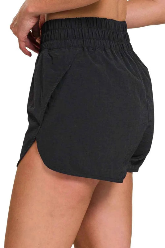 Zenana Windbreaker Smocked Waistband Running Shorts 84a61137-8fd7-4617-b5d5-d8bdc871851a-Max-Origin