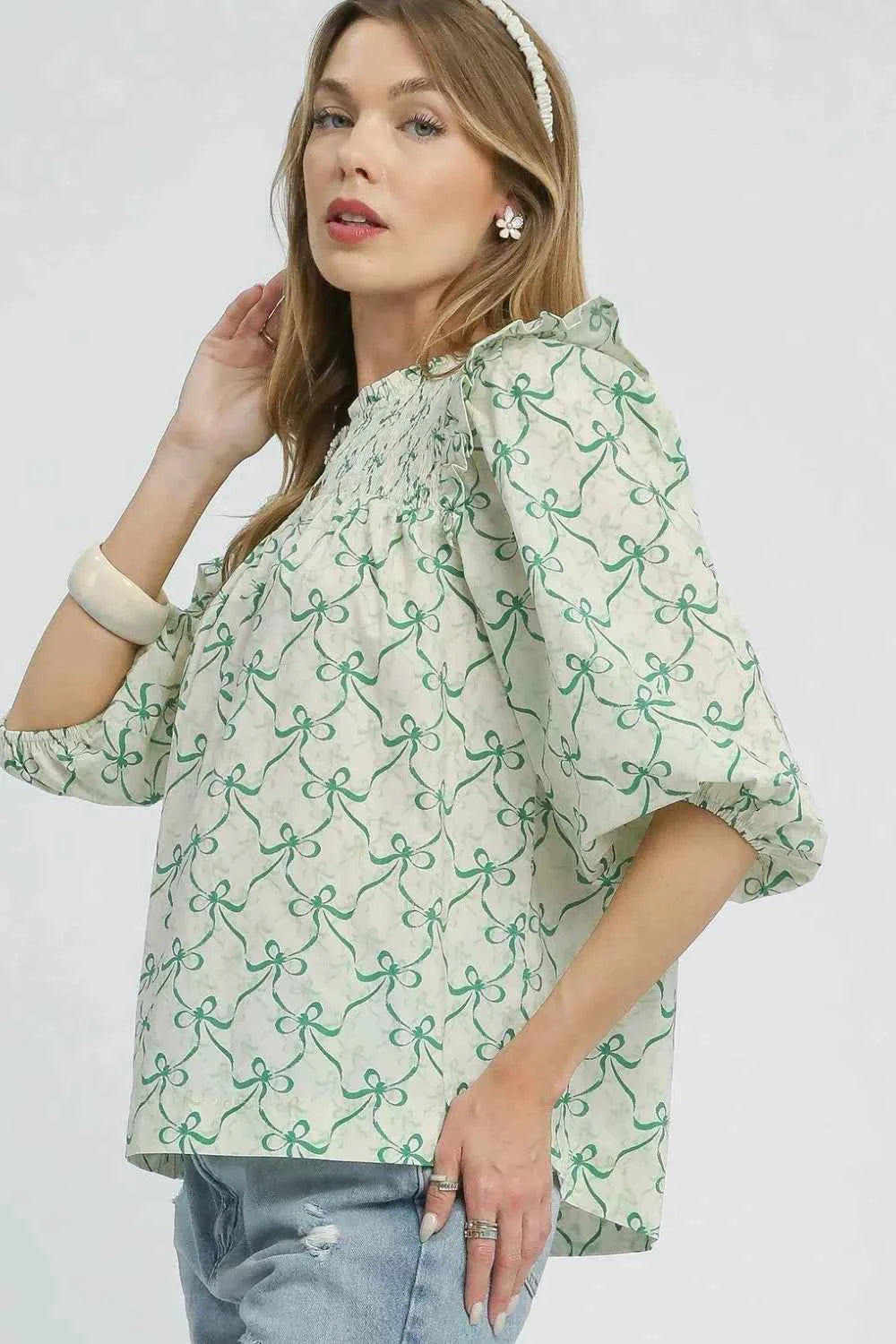 Umgee Ruffled Bow Print Notched Blouse 8ab1e368-54b8-4f3d-9515-c10af8cb366a-Max-Origin