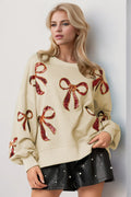 Double Take Christmas Bow Sequin Round Neck Dropped Shoulder Sweatshirt Cream 8c93fd56-2076-4520-a351-873ad80ab8fc-Max