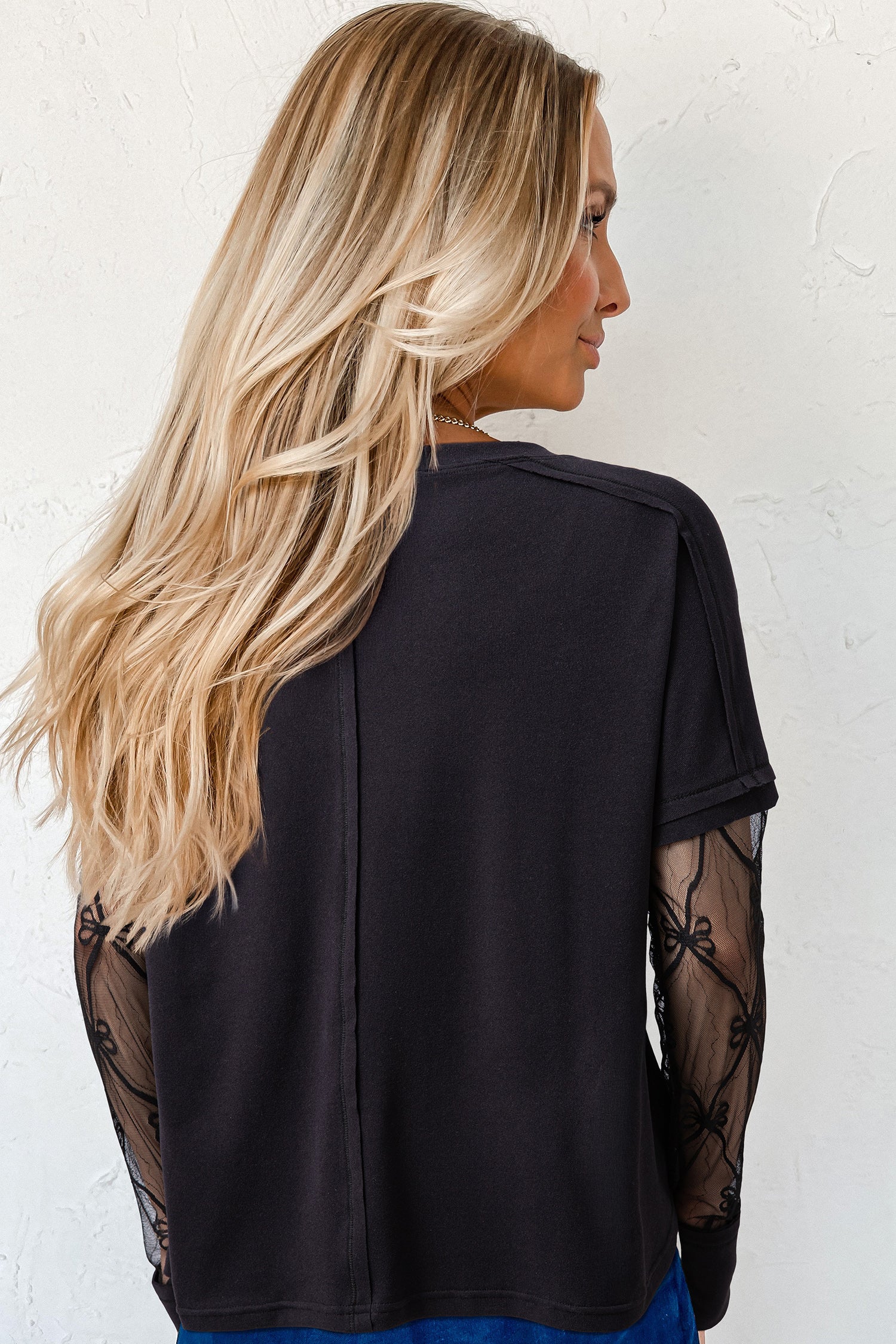 Black Solid Color Bow Textured Patchwork Long Sleeve Tee 8cb49dce4985af66